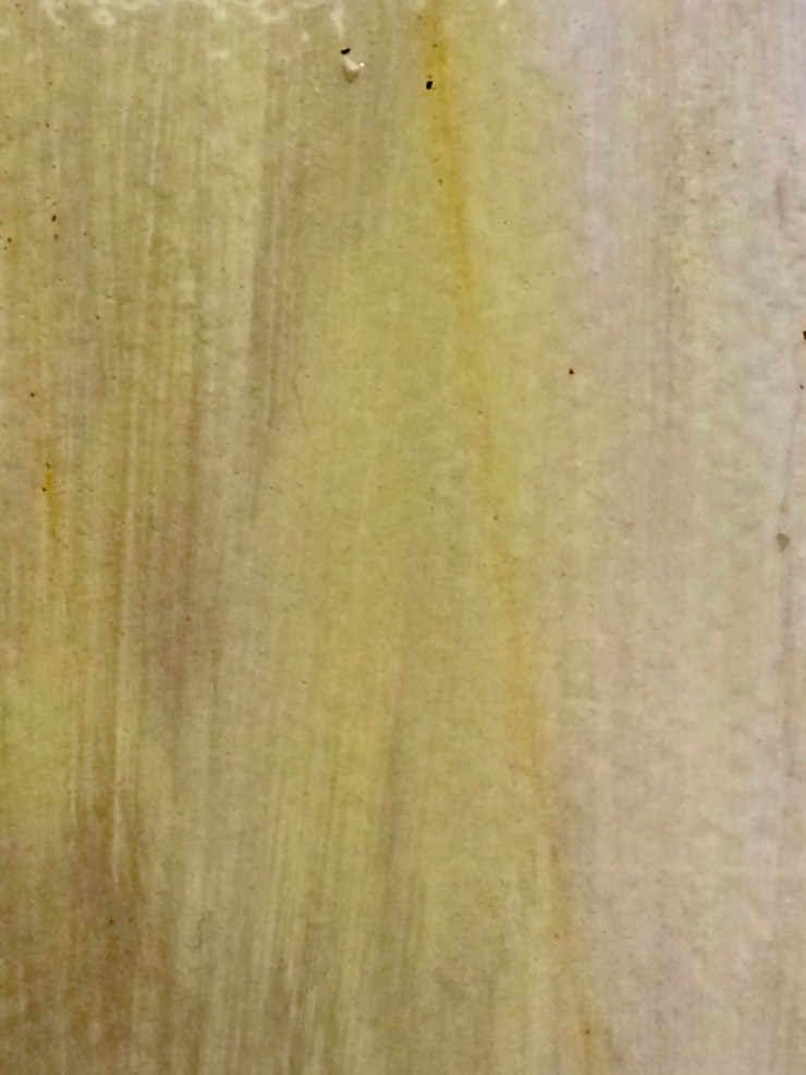 a yellow paint stroke